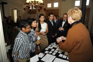 Student Laureates and guests getting badges